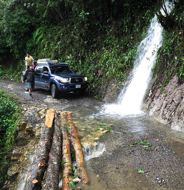 on our way to the Yaxlik Cave, logs used to fix the road, Alta Verapaz